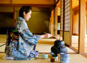 Asian Woman Wearing Kimono Making Tea