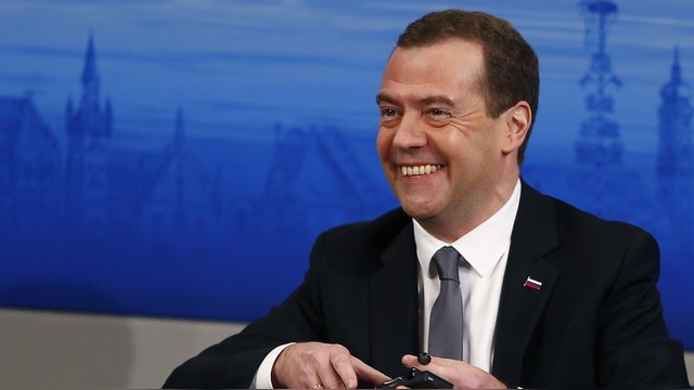 Russian Prime Minister Dmitry Medvedev smiles as he attends at the Munich Security Conference in Munich, Germany, February 13, 2016. REUTERS/Michael Dalder - RTX26QJ3